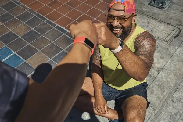 Man with Fitbit Charge 6 working out